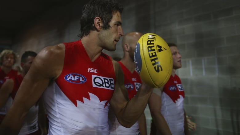 SYDNEY, AUSTRALIA - SEPTEMBER 19: Josh Kennedy of the Swans walks out during the First AFL Semi Final match between the Sydney Swans and the North Melbourne Kangaroos at ANZ Stadium on September 19, 2015 in Sydney, Australia. (Photo by Ryan Pierse/Getty Images)